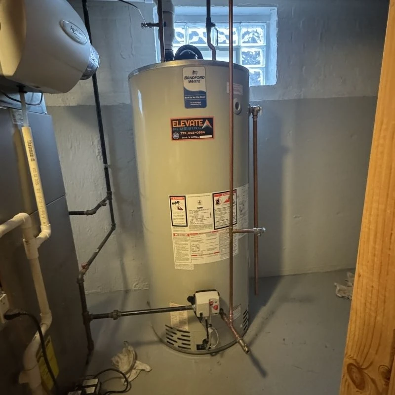 Reliable Bradford White traditional tank water heater replacement featuring secure copper supply lines and a new gas valve in a Morton Grove basement.